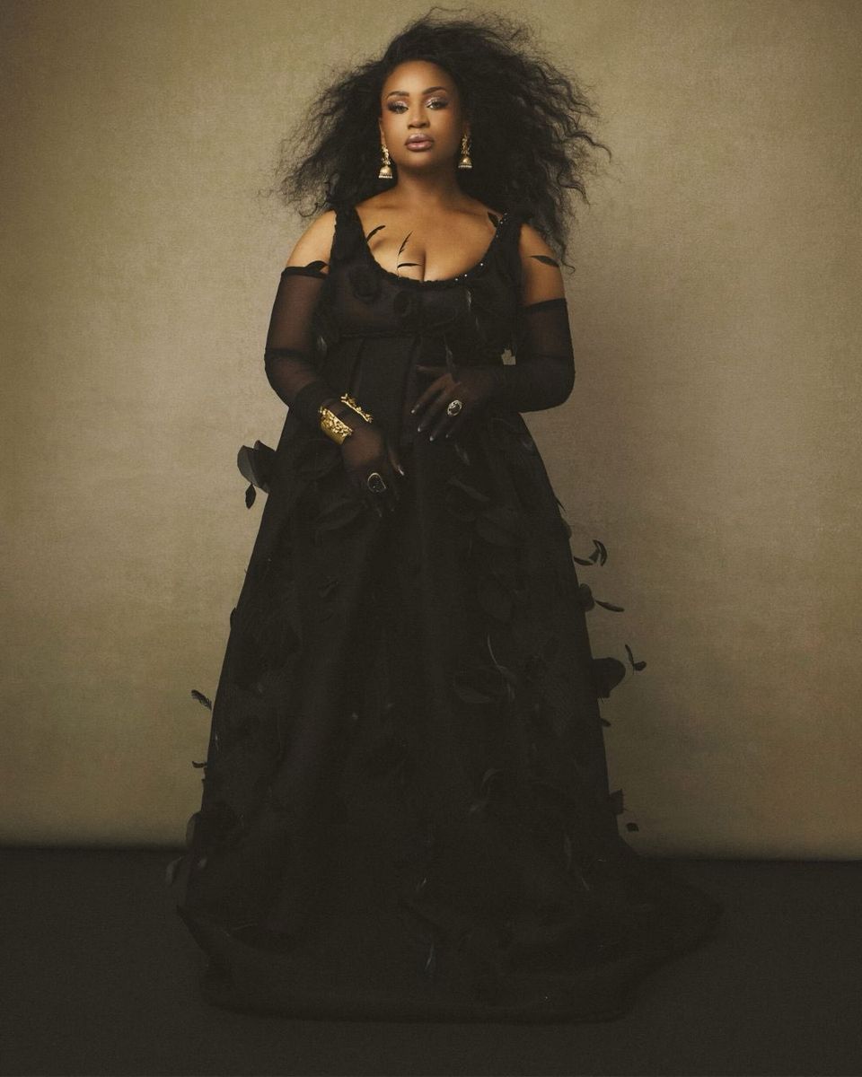 Black tulle gown with feathers